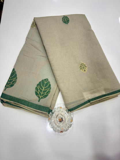 Green kora silk style viscose saree with woven detailing, tassel pallu and embroidered unstitched blouse fabric for women