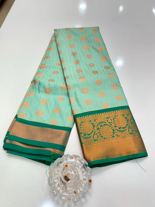 Kanchipuram Style Silk Saree with Rich Zari Border – Festive Wear
