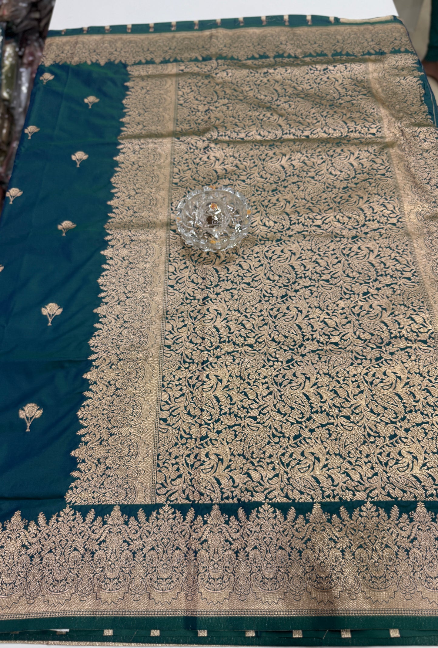 Soft silk saree with woven floral border and contrast brocade blouse piece