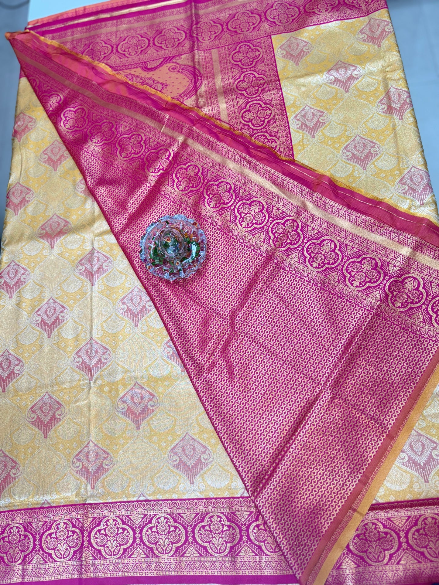 Tissue silk saree with rich zari weaving and contrast border for women