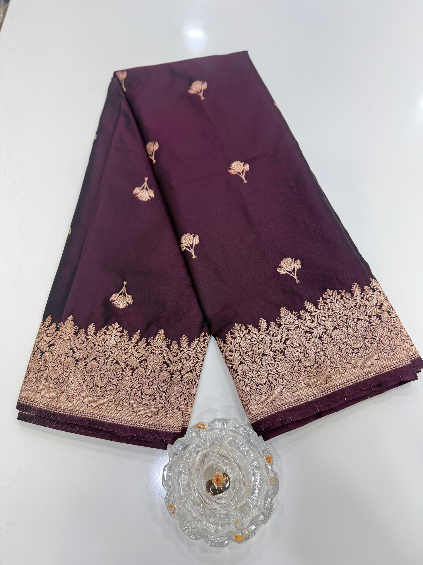 Soft silk saree with woven floral border and contrast brocade blouse piece