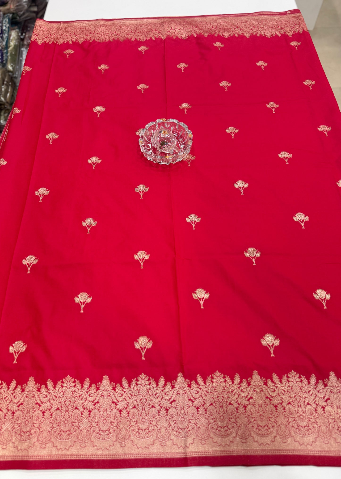 Soft silk saree with woven floral border and contrast brocade blouse piece