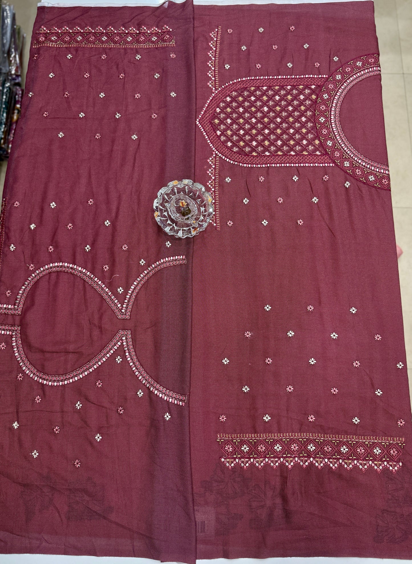 Pink kora silk style viscose saree with woven motifs and embroidered unstitched blouse fabric for festive wear