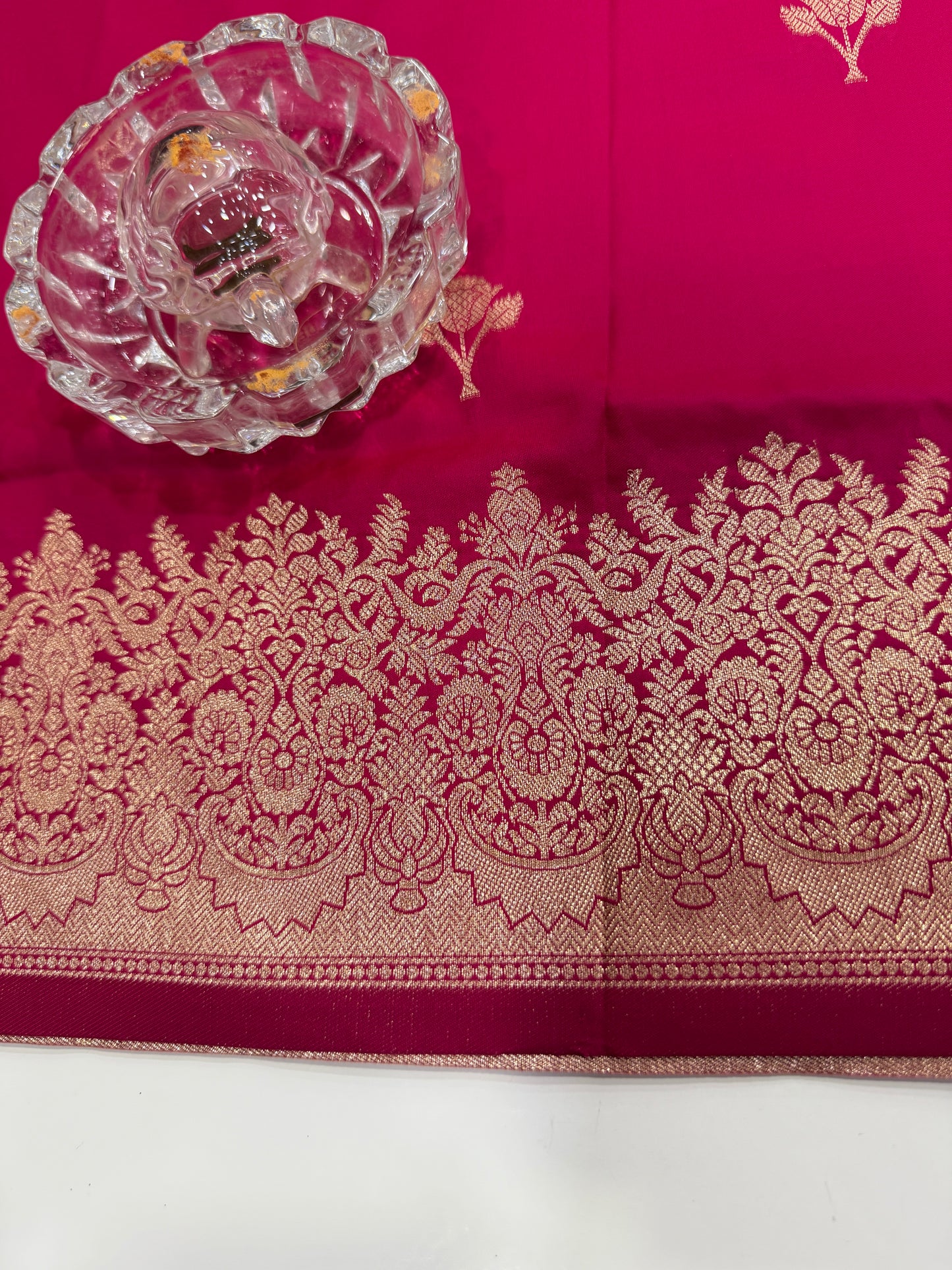 Soft silk saree with woven floral border and contrast brocade blouse piece