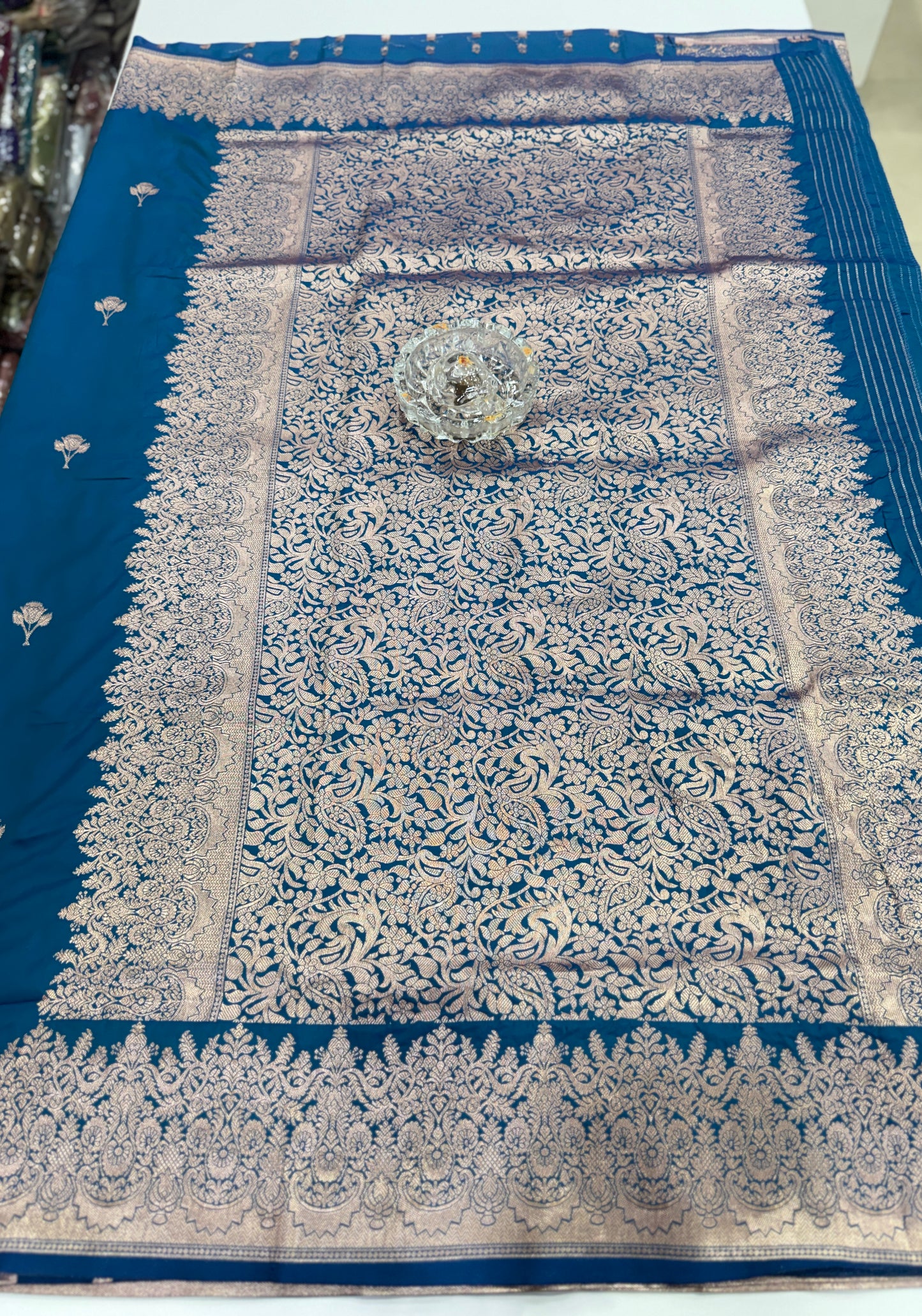 Soft silk saree with woven floral border and contrast brocade blouse piece