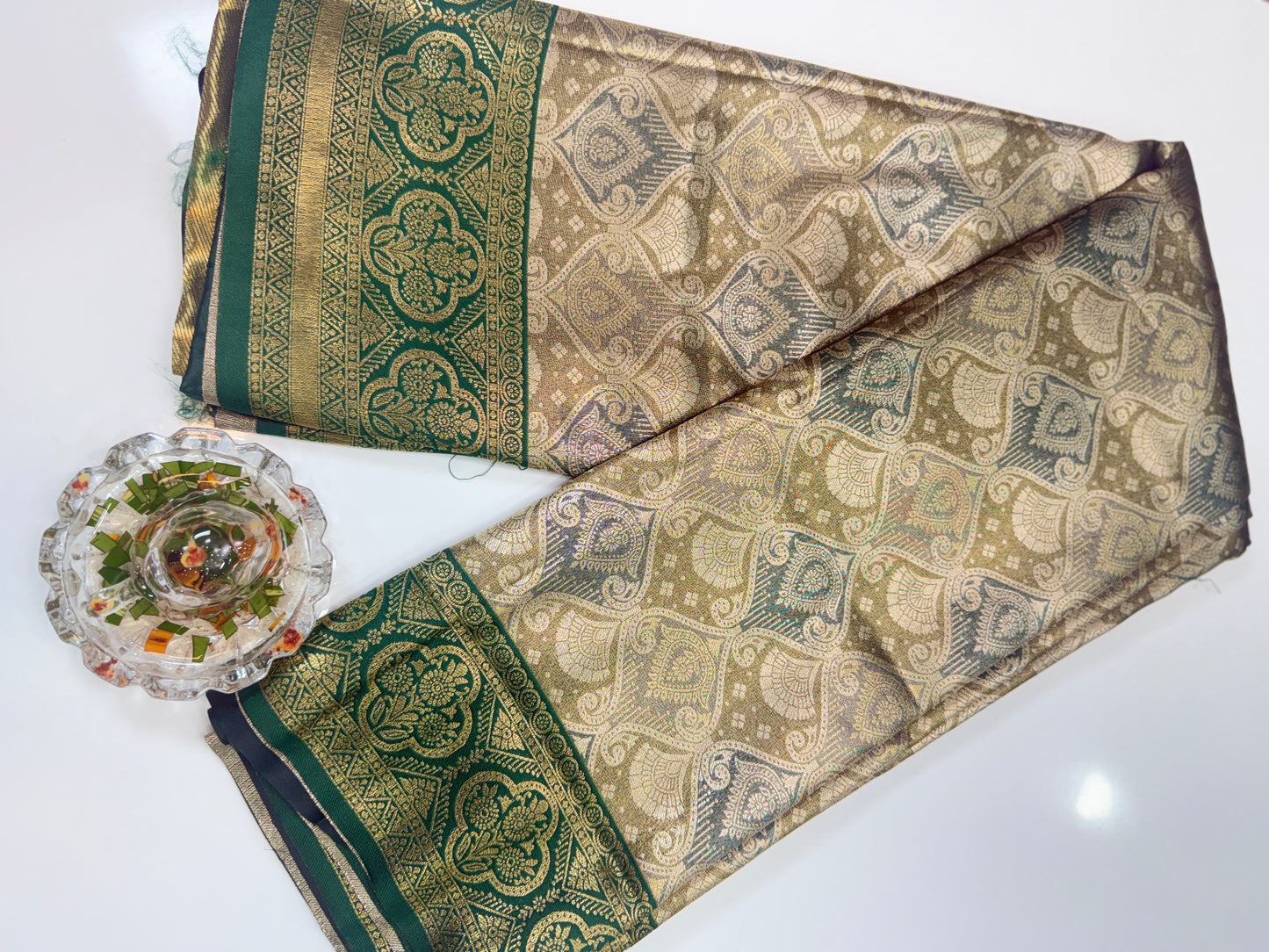 Tissue silk saree with rich zari weaving and contrast border for women