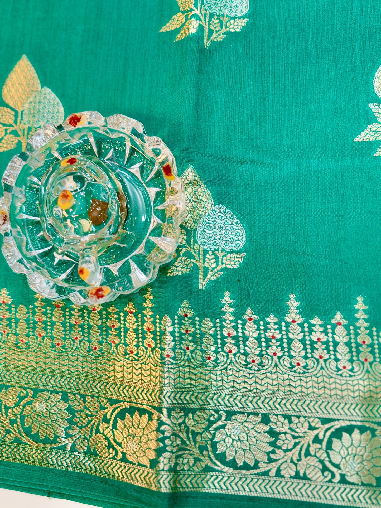 Handloom Pure Chhiniya Silk Saree in bottle green with Meenakari Zari Weaving and Buta Work