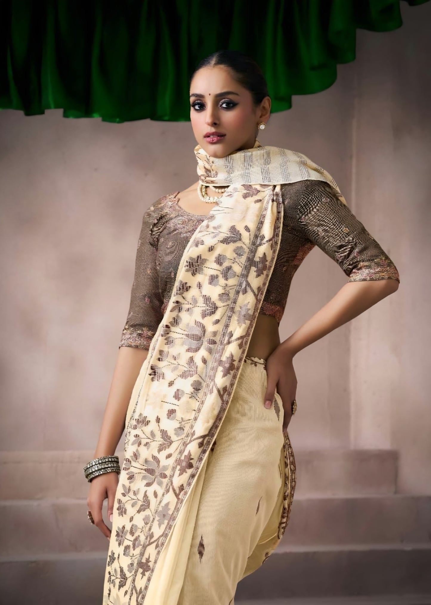 Ivory beige kora silk style viscose saree with woven motifs, tassel pallu and embroidered blouse fabric for women