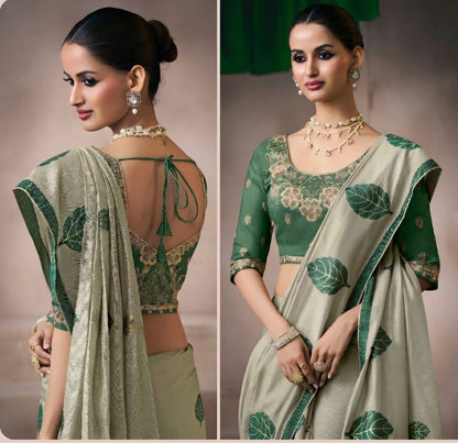 Green kora silk style viscose saree with woven detailing, tassel pallu and embroidered unstitched blouse fabric for women