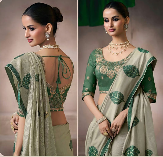 Green kora silk style viscose saree with woven detailing, tassel pallu and embroidered unstitched blouse fabric for women