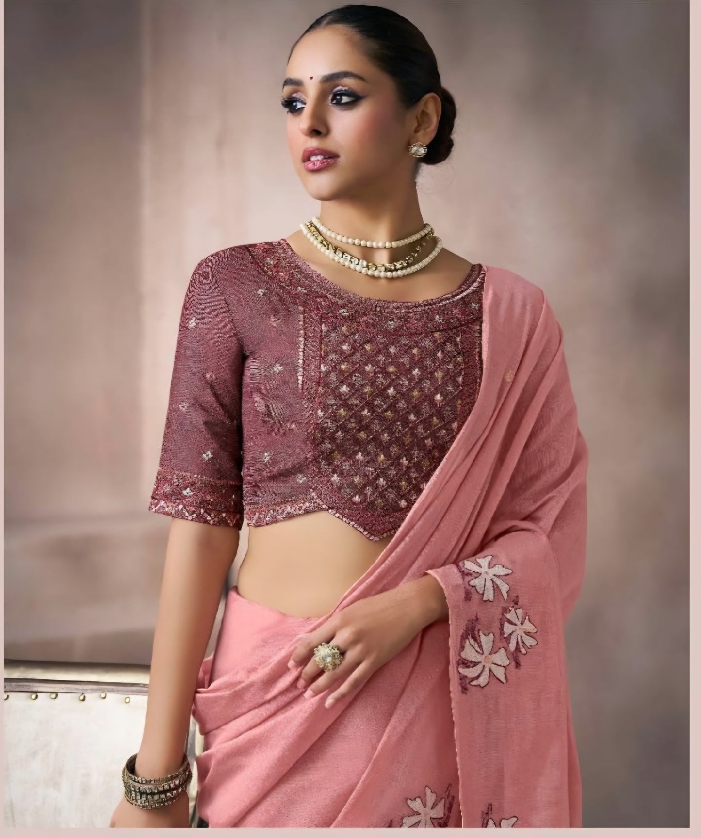 Pink kora silk style viscose saree with woven motifs and embroidered unstitched blouse fabric for festive wear