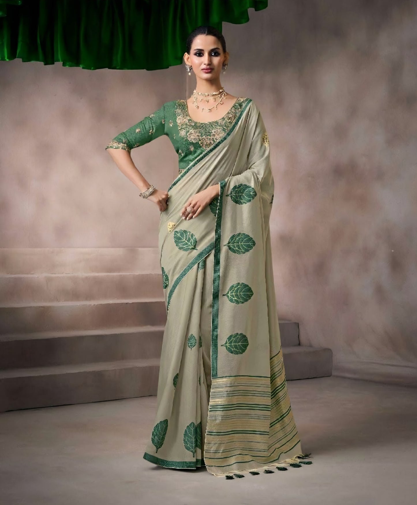 Green kora silk style viscose saree with woven detailing, tassel pallu and embroidered unstitched blouse fabric for women