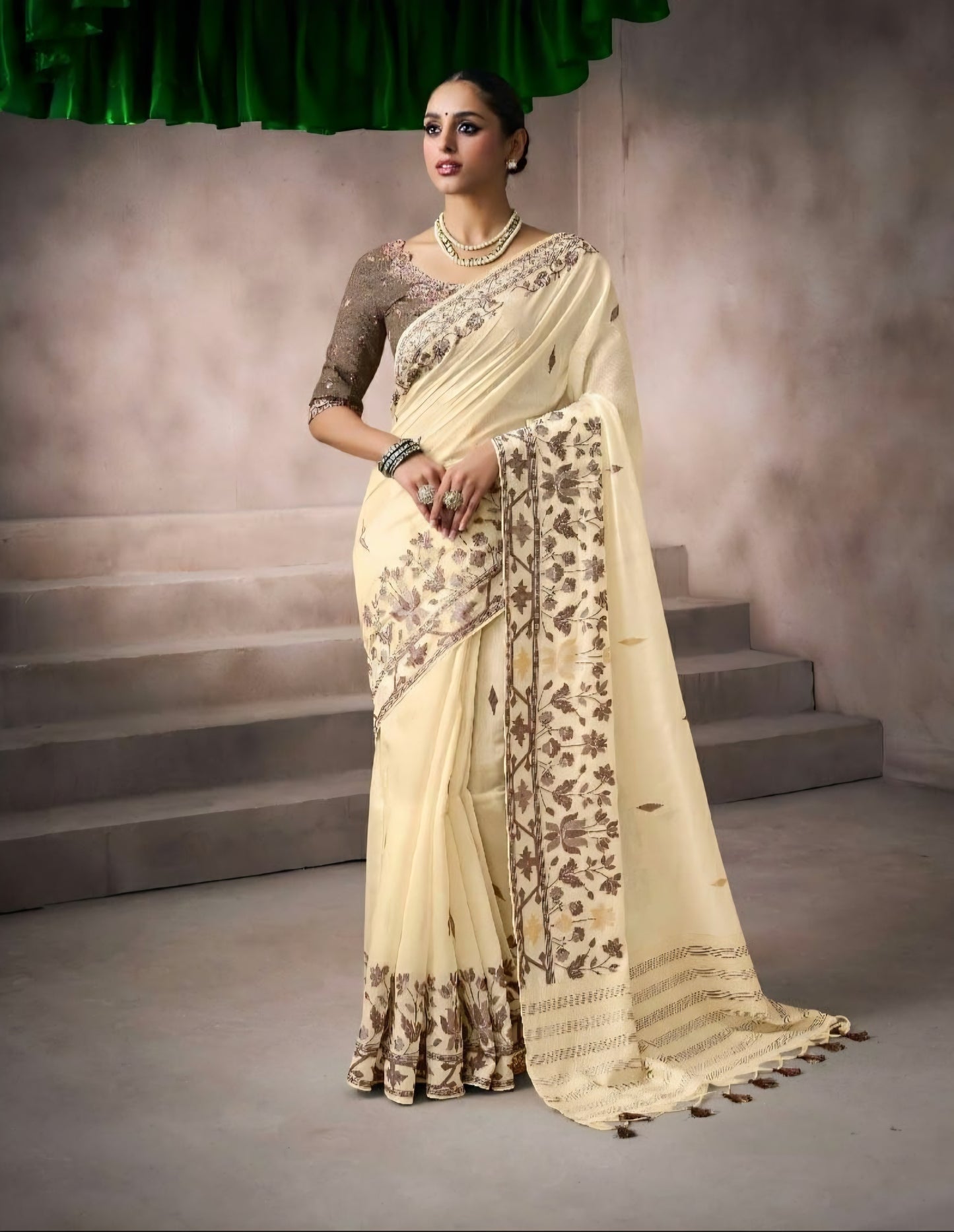 Ivory beige kora silk style viscose saree with woven motifs, tassel pallu and embroidered blouse fabric for women